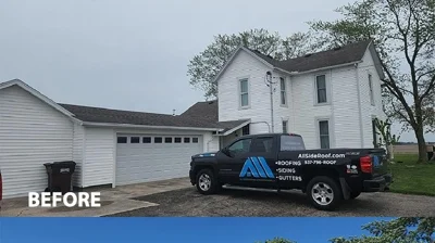 All-Side Roofing & Restoration LLC truck parked in front of a house before renovation