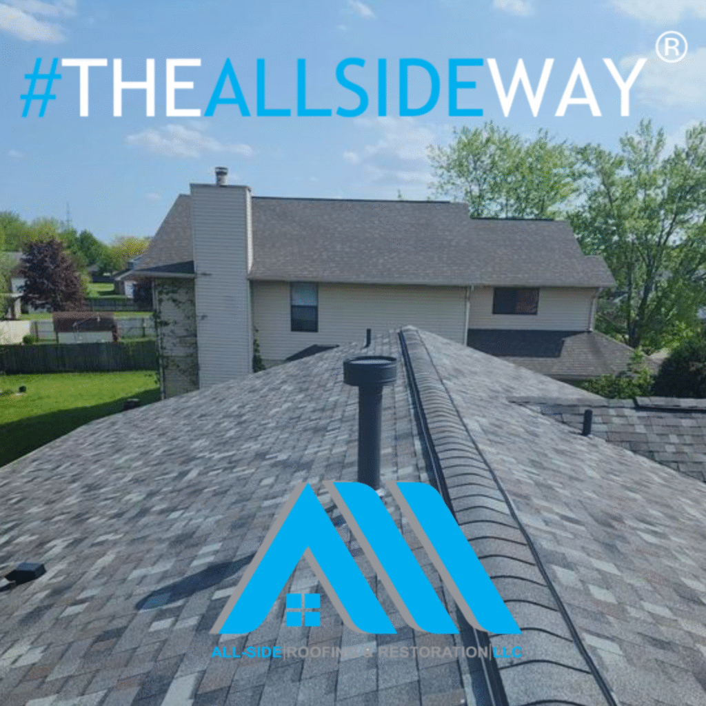 View of a residential rooftop with gray shingles and chimney in Miamisburg, OH, branding text “#THEALLSIDEWAY” and blue logo.