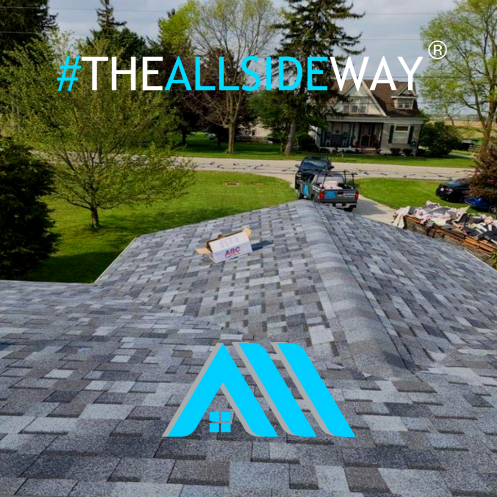 Newly installed gray shingle roof in Trenton, OH with roofing materials package, blue logo, and #THEALLSIDEWAY text overlay.